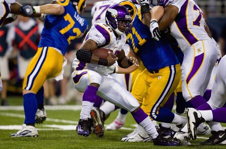ST. LOUIS, MO - OCTOBER 11: Adrian Peterson #28 of the Minnesota Vikings rushes against the St. Louis Rams at the Edward Jones Dome on October 11, 2009 in St. Louis, Missouri.  The Vikings beat the Rams 38-10.  <br /><br /><span class="help">(Photo by Dilip Vishwanat/Getty Images)</span>