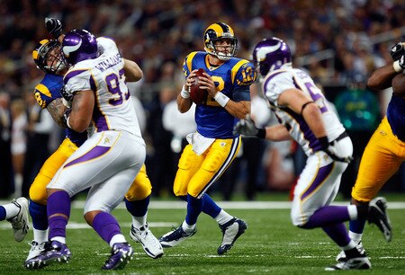 ST. LOUIS - OCTOBER 11: Quarterback Kyle Boller #12 of the St. Louis Rams drops back to pass against the Minnesota Vikings at Edward Jones Dome on October 11, 2009 in St. Louis, Missouri.  <br /><br /><span class="help">(Photo by Ronald Martinez/Getty Images)</span>