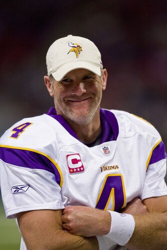 ST. LOUIS, MO - OCTOBER 11: Brett Favre #4 of the Minnesota Vikings looks on from the sideline against the St. Louis Rams at the Edward Jones Dome on October 11, 2009 in St. Louis, Missouri.  The Vikings beat the Rams 38-10.  <br /><br /><span class="help">(Photo by Dilip Vishwanat/Getty Images)</span>