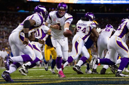 ST. LOUIS, MO - OCTOBER 11: Brett Favre #4 of the Minnesota Vikings hands the ball off against the St. Louis Rams at the Edward Jones Dome on October 11, 2009 in St. Louis, Missouri.  The Vikings beat the Rams 38-10.  <br /><br /><span class="help">(Photo by Dilip Vishwanat/Getty Images)</span>
