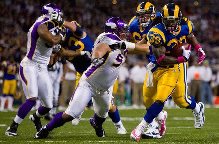 ST. LOUIS, MO - OCTOBER 11: Steven Jackson #39 of the St. Louis Rams gets past Kevin Williams #93 of the Minnesota Vikings at the Edward Jones Dome on October 11, 2009 in St. Louis, Missouri.  <br /><br /><span class="help">(Photo by Dilip Vishwanat/Getty Images)</span>