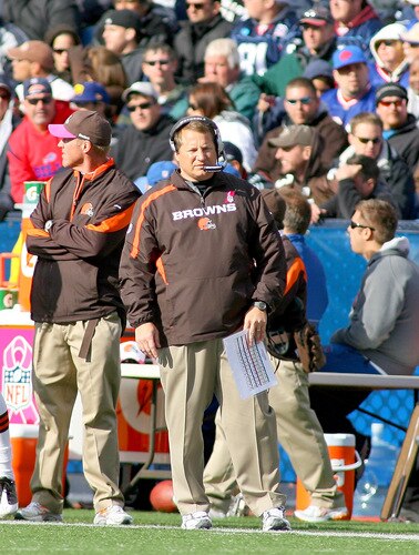 ORCHARD PARK, NY - OCTOBER 11: Eric Mangini, head coach  of the Cleveland Browns stands on the sidelines against the Buffalo Bills at Ralph Wilson Stadium on October 11, 2009 in Orchard Park, New York. Cleveland won 6-3. <br /><br /><span class="help">(Photo by Rick Stewart/Getty Images)</span>