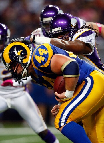ST. LOUIS - OCTOBER 11:  Fullback Mike Karney #44 of the St. Louis Rams is tackled by E.J. Henderson #56 of the Minnesota Vikings at Edward Jones Dome on October 11, 2009 in St. Louis, Missouri.  <br /><br /><span class="help">(Photo by Ronald Martinez/Getty Images)</span>