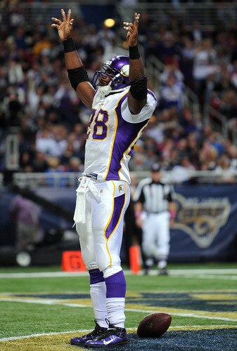 ST. LOUIS - OCTOBER 11:  :  Running back Adrian Peterson #28 of the Minnesota Vikings celebrates his touchdown against the St. Louis Rams at Edward Jones Dome on October 11, 2009 in St. Louis, Missouri.  <br /><br /><span class="help">(Photo by Ronald Martinez/Getty Images)</span>