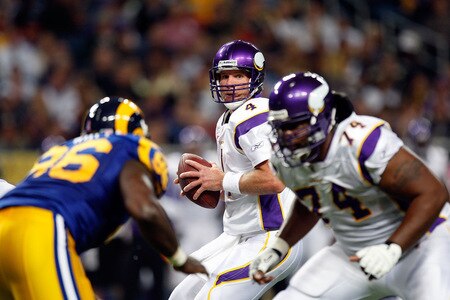 ST. LOUIS - OCTOBER 11:  :  Quarterback Brett Favre #4 of the Minnesota Vikings drops back to pass against the St. Louis Rams at Edward Jones Dome on October 11, 2009 in St. Louis, Missouri.  <br /><br /><span class="help">(Photo by Ronald Martinez/Getty Images)</span>