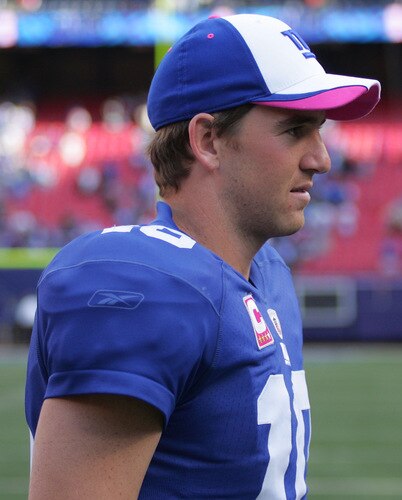 EAST RUTHERFORD, NJ - OCTOBER 11:  Eli Manning #10 of the New York Giants walks off the field at the end of the game against the Oakland Raiders on October 11, 2009 at Giants Stadium in East Rutherford, New Jersey.  <br /><br /><span class="help">(Photo by Jared Wickerham/Getty Images)</span>