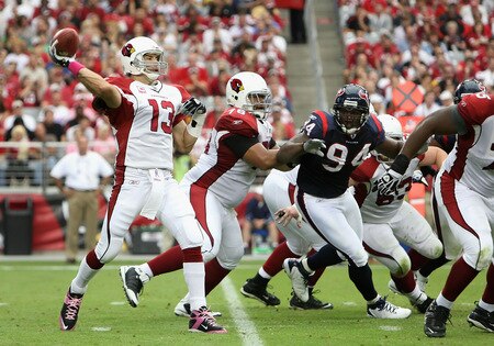 GLENDALE, AZ - OCTOBER 11:  Quarterback Kurt Warner #13 of the Arizona Cardinals drops back to pass during the NFL game against the Houston Texans at the Universtity of Phoenix Stadium on October 11, 2009 in Glendale, Arizona.  <br /><br /><span class="help">(Photo by Christian Petersen/Getty Images)</span>