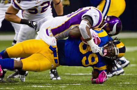 ST. LOUIS, MO - OCTOBER 11: Steven Jackson #39 of the St. Louis Rams is tackled against the Minnesota Vikings at the Edward Jones Dome on October 11, 2009 in St. Louis, Missouri.  <br /><br /><span class="help">(Photo by Dilip Vishwanat/Getty Images)</span>