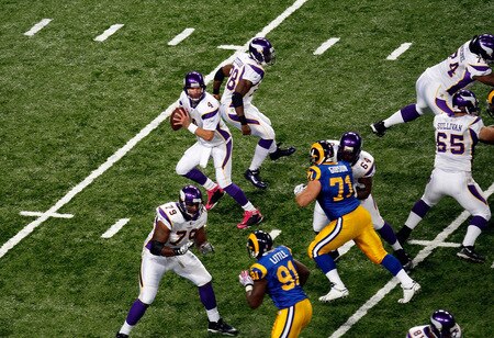 ST. LOUIS - OCTOBER 11:  Quarterback Brett Favre #4 of the Minnesota Vikings drops back to pass against the St. Louis Rams at Edward Jones Dome on October 11, 2009 in St. Louis, Missouri.  <br /><br /><span class="help">(Photo by Ronald Martinez/Getty Images)</span>