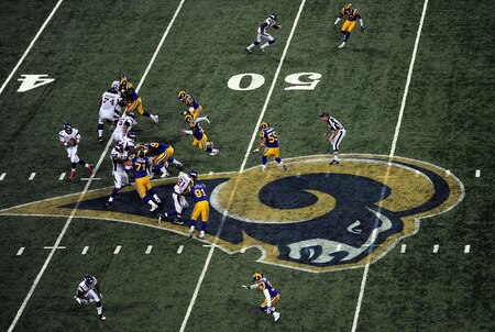 ST. LOUIS - OCTOBER 11: Quarterback Brett Favre #4 of the Minnesota Vikings drops back to pass against the St. Louis Rams at Edward Jones Dome on October 11, 2009 in St. Louis, Missouri.  <br /><br /><span class="help">(Photo by Ronald Martinez/Getty Images)</span>