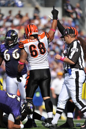 BALTIMORE - OCTOBER 11:  Jonathan Fanene #68 of the Cincinnati Bengals celebrates a sack of Joe Flacco #5 of the Baltimore Ravens at M&T Bank Stadium on October 11, 2009 in Baltimore, Maryland. The Bengals defeated the Ravens 17-14. <br /><br /><span class="help">(Photo by Larry French/Getty Images)</span>