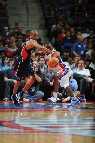 AUBURN HILLS, MI - OCTOBER 11:  Juan Dixon #3 of the Atlanta Hawks fights for a loose ball with Ben Gordon #7 of the Detroit Pistons in a preseason game at the Palace of Auburn Hills on October 11, 2009 in Auburn Hills, Michigan.  <br /><br /><span class="help">(Photo by D. Lippitt/Einstein/NBAE via Getty Images)</span>