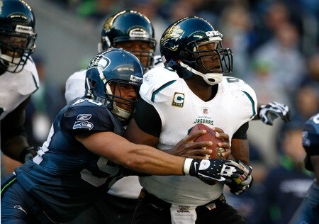 SEATTLE, WA - OCTOBER 11:  Quarterback David Garrard #9 of the Jacksonville Jaguars is sacked by Nick Reed #98 of the Seattle Seahawks   at Qwest Field on October 11, 2009 in Seattle, Washington.  <br /><br /><span class="help">(Photo by Jonathan Ferrey/Getty Images)</span>