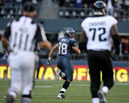 SEATTLE - OCTOBER 11:  Defensive end Nick Reed #98 of the Seattle Seahawks returns a fumble for a touchdown against the Jacksonville Jaguars on October 11, 2009 at Qwest Field in Seattle, Washington. The Seahawks defeated the Jaguars 41-0. <br /><br /><span class="help">(Photo by Otto Greule Jr/Getty Images)</span>