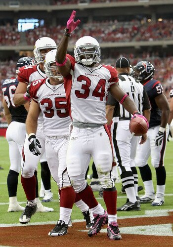 GLENDALE, AZ - OCTOBER 11:  Runningback Tim Hightower #34 of the Arizona Cardinals celebrates after scoring on a 1 yard rushing touchdown against the Houston Texans during the first quarter of the NFL game at the Universtity of Phoenix Stadium on October 11, 2009 in Glendale, Arizona.  <br /><br /><span class="help">(Photo by Christian Petersen/Getty Images)</span>