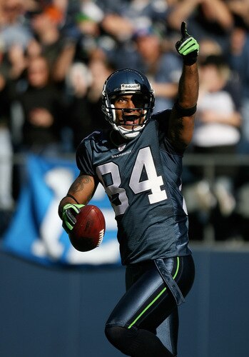 SEATTLE - OCTOBER 11:  Wide receiver T.J. Houshmandzadeh #84 of the Seattle Seahawks celebrates after scoring a touchdown against the Jacksonville Jaguars on October 11, 2009 at Qwest Field in Seattle, Washington. The Seahawks defeated the Jaguars 41-0. <br /><br /><span class="help">(Photo by Otto Greule Jr/Getty Images)</span>