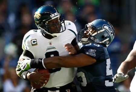 SEATTLE, WA - OCTOBER 11:  Quarterback David Garrard #9 of the Jacksonville Jaguars ids sacked by Darryl Tapp #55 of the Seattle Seahawks   at Qwest Field on October 11, 2009 in Seattle, Washington.  <br /><br /><span class="help">(Photo by Jonathan Ferrey/Getty Images)</span>