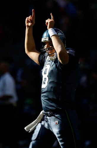 SEATTLE, WA - OCTOBER 11:  Quarterback Matt Hasselbeck #8 of the Seattle Seahawks celebrates a touchdown pass in te second quarter against the Jacksonville Jaguars at Qwest Field on October 11, 2009 in Seattle, Washington.  <br /><br /><span class="help">(Photo by Jonathan Ferrey/Getty Images)</span>