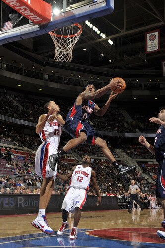 AUBURN HILLS, MI - OCTOBER 11:  Jeff Teague #0 of the Atlanta Hawks drives around Tayshaun Prince  #22 of the Detroit Pistons in a preseason game at the Palace of Auburn Hills on October 11, 2009 in Auburn Hills, Michigan.  <br /><br /><span class="help">(Photo by Allen Einstein/NBAE via Getty Images)</span>