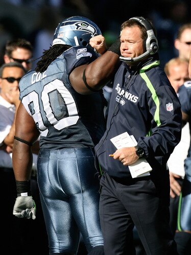 SEATTLE - OCTOBER 11:  Head coach Jim Mora of the Seattle Seahawks celebrates with defensive tackle Colin Cole #90 after a goal line stand against the Jacksonville Jaguars on October 11, 2009 at Qwest Field in Seattle, Washington. The Seahawks defeated the Jaguars 41-0. <br /><br /><span class="help">(Photo by Otto Greule Jr/Getty Images)</span>