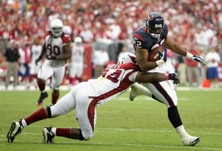 GLENDALE, AZ - OCTOBER 11: Runningback Chris Brown #22 of the Houston Texans runs with the ball after a reception under pressure from Gerald Hayes #54 of the Arizona Cardinals during the NFL game at the Universtity of Phoenix Stadium on October 11, 2009 in Glendale, Arizona. <br /><br /><span class="help">(Photo by Christian Petersen/Getty Images)</span>