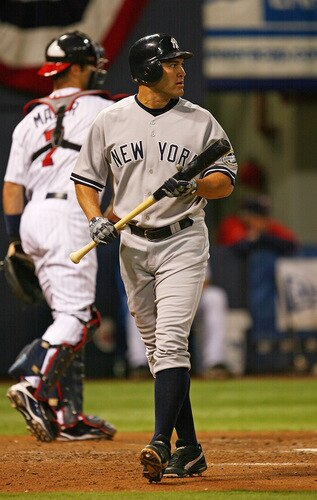 MINNEAPOLIS - OCTOBER 11: Johnny Damon #18 of the New York Yankees looks at pitcher Carl Pavano of the Minnesota Twins after striking out in the 3rd inning in Game Three of the ALDS during the 2009 MLB Playoffs at the Hubert H. Humphrey Metrodome on October 11, 2009 in Minneapolis, Minnesota. <br /><br /><span class="help">(Photo by Jonathan Daniel/Getty Images)</span>