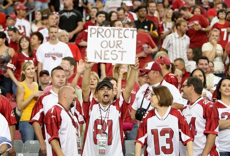 GLENDALE, AZ - OCTOBER 11: A fan of the Arizona Cardinals hold up a sign reading "protect our nest" during the NFL game against the Houston Texans at the Universtity of Phoenix Stadium on October 11, 2009 in Glendale, Arizona. <br /><br /><span class="help">(Photo by Christian Petersen/Getty Images)</span>