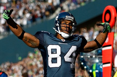 SEATTLE, WA - OCTOBER 11:  T. J. Houshmandzadeh #84 of the Seattle Seahawks celebrates scoring a touchdown against the Jacksonville Jaguars at Qwest Field on October 11, 2009 in Seattle, Washington.  <br /><br /><span class="help">(Photo by Jonathan Ferrey/Getty Images)</span>