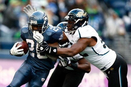 SEATTLE, WA - OCTOBER 11:  Justin Forsett #20 of the Seattle Seahawks runs with the ball against the Jacksonville Jaguars at Qwest Field on October 11, 2009 in Seattle, Washington.  <br /><br /><span class="help">(Photo by Jonathan Ferrey/Getty Images)</span>