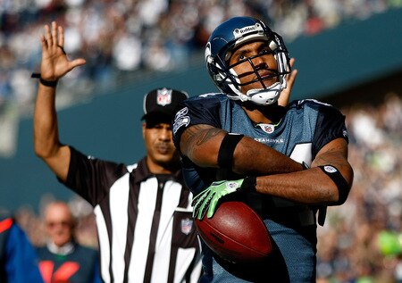 SEATTLE, WA - OCTOBER 11:  T. J. Houshmandzadeh #84 of the Seattle Seahawks celebrates scoring a touchdown against the Jacksonville Jaguars at Qwest Field on October 11, 2009 in Seattle, Washington.  <br /><br /><span class="help">(Photo by Jonathan Ferrey/Getty Images)</span>