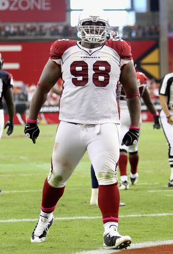 GLENDALE, AZ - OCTOBER 11: Defensive tackle Gabe Watson #98 of the Arizona Cardinals celebrates after stopping the Houston Texans on a fourth and goal during the final moments of the NFL game at the Universtity of Phoenix Stadium on October 11, 2009 in Glendale, Arizona. <br /><br /><span class="help">(Photo by Christian Petersen/Getty Images)</span>