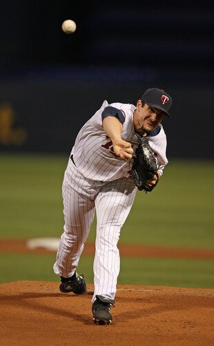 MINNEAPOLIS - OCTOBER 11: Carl Pavano #48 of the Minnesota Twins delivers the ball against the New York Yankees in Game Three of the ALDS during the 2009 MLB Playoffs at the Hubert H. Humphrey Metrodome on October 11, 2009 in Minneapolis, Minnesota. <br /><br /><span class="help">(Photo by Jonathan Daniel/Getty Images)</span>