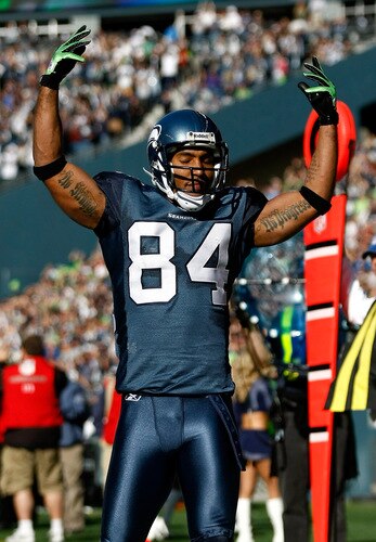 SEATTLE, WA - OCTOBER 11:  T. J. Houshmandzadeh #84 of the Seattle Seahawks celebrates scoring a touchdown against the Jacksonville Jaguars at Qwest Field on October 11, 2009 in Seattle, Washington.  <br /><br /><span class="help">(Photo by Jonathan Ferrey/Getty Images)</span>