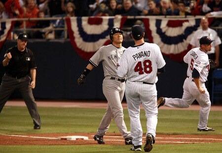 MINNEAPOLIS, MN - OCTOBER 11: Hideki Matsui #55 of the New York Yankees reacts after being tagged out by Michael Cuddyer #5 of the Minnesota Twins in the fifth inning in Game Three of the ALDS during the 2009 MLB Playoffs at the Hubert H. Humphrey Metrodome on October 11, 2009 in Minneapolis, Minnesota. <br /><br /><span class="help">(Photo by Genevieve Ross/Getty Images)</span>
