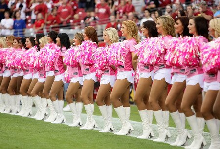 GLENDALE, AZ - OCTOBER 11: The Arizona Cardinal's cheerleaders, wearing pink in honor of cancer awarness, line up before the NFL game against the Houston Texans at the Universtity of Phoenix Stadium on October 11, 2009 in Glendale, Arizona. <br /><br /><span class="help">(Photo by Christian Petersen/Getty Images)</span>