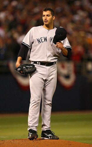 MINNEAPOLIS - OCTOBER 11: Andy Pettitte #46 of the New York Yankees reacts after giving up a run-scoring hit to Joe Mauer of the Minnesota Twins in Game Three of the ALDS during the 2009 MLB Playoffs at the Hubert H. Humphrey Metrodome on October 11, 2009 in Minneapolis, Minnesota. <br /><br /><span class="help">(Photo by Jonathan Daniel/Getty Images)</span>