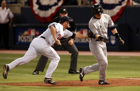 MINNEAPOLIS, MN - OCTOBER 11: Michael Cuddyer #5 of the Minnesota Twins tags out Hideki Matsui #55 of the New York Yankees in the fifth inning in Game Three of the ALDS during the 2009 MLB Playoffs at the Hubert H. Humphrey Metrodome on October 11, 2009 in Minneapolis, Minnesota. <br /><br /><span class="help">(Photo by Genevieve Ross/Getty Images)</span>