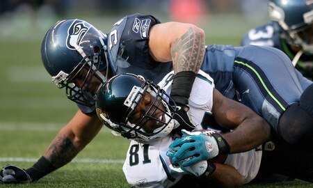 SEATTLE - OCTOBER 11:  Wide receiver Torry Holt #81 of the Jacksonville Jaguars is tackled by Lofa Tatupu #51 of the Seattle Seahawks on October 11, 2009 at Qwest Field in Seattle, Washington. The Seahawks defeated the Jaguars 41-0. <br /><br /><span class="help">(Photo by Otto Greule Jr/Getty Images)</span>