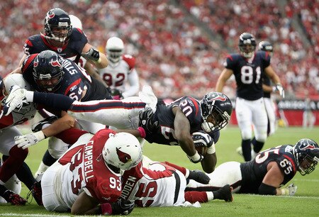 GLENDALE, AZ - OCTOBER 11: Runningback Steve Slaton #20 of the Houston Texans attempts to dive into the endzone over Calais Campbell #93 of the Arizona Cardinals during the NFL game at the Universtity of Phoenix Stadium on October 11, 2009 in Glendale, Arizona. <br /><br /><span class="help">(Photo by Christian Petersen/Getty Images)</span>