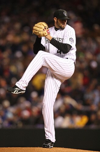 DENVER - OCTOBER 11:  Jason Hammel #46 of the Colorado Rockies pitches against the Philadelphia Phillies in Game Three of the NLDS during the 2009 MLB Playoffs at Coors Field on October 11, 2009 in Denver, Colorado.  <br /><br /><span class="help">(Photo by Jed Jacobsohn/ Getty Images)</span>