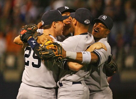 MINNEAPOLIS - OCTOBER 11: (L-R) Mark Teixeira #25, Alex Rodriguez #13, Derek Jeter #2 and Robinson Cano #24 of the New York Yankees celebrate a win over the Minnesota Twins in Game Three of the ALDS during the 2009 MLB Playoffs at the Hubert H. Humphrey Metrodome on October 11, 2009 in Minneapolis, Minnesota. <br /><br /><span class="help">(Photo by Jonathan Daniel/Getty Images)</span>