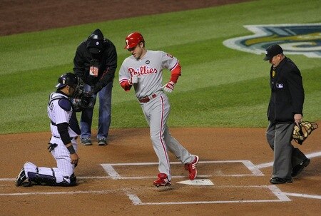 DENVER - OCTOBER 11:  Chase Utley #26 of the Philadelphia Phillies hits a home run against the Colorado Rockies in the first inning in Game Three of the NLDS during the 2009 MLB Playoffs at Coors Field on October 11, 2009 in Denver, Colorado. <br /><br /><span class="help">(Photo by Doug Pensinger/Getty Images)</span>