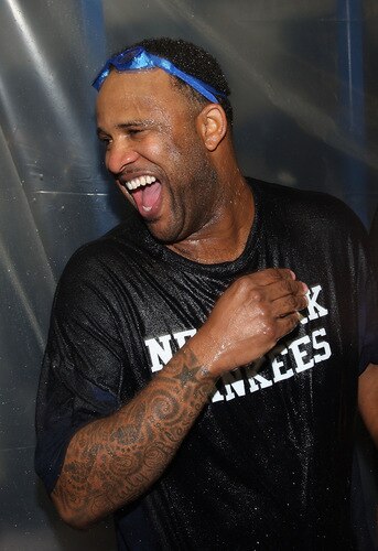 MINNEAPOLIS - OCTOBER 11: C.C. Sabathia of the New York Yankees celebrates in the locker room after a win over the Minnesota Twins in Game Three of the ALDS during the 2009 MLB Playoffs at the Hubert H. Humphrey Metrodome on October 11, 2009 in Minneapolis, Minnesota. <br /><br /><span class="help">(Photo by Jonathan Daniel/Getty Images)</span>