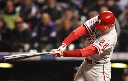 DENVER - OCTOBER 11:  Chase Utley #26 of the Philadelphia Phillies hits a home run against the Colorado Rockies in the first inning in Game Three of the NLDS during the 2009 MLB Playoffs at Coors Field on October 11, 2009 in Denver, Colorado. <br /><br /><span class="help">(Photo by Jed Jacobsohn/Getty Images)</span>