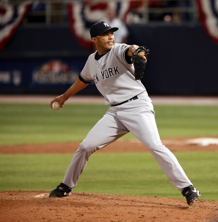 MINNEAPOLIS, MN - OCTOBER 11: Pitcher Mariano Rivera #42 of the New York Yankees throws in the ninth inning in Game Three of the ALDS during the 2009 MLB Playoffs at the Hubert H. Humphrey Metrodome on October 11, 2009 in Minneapolis, Minnesota. The Yankees defeated the Twins 4-1. <br /><br /><span class="help">(Photo by Genevieve Ross/Getty Images)</span>