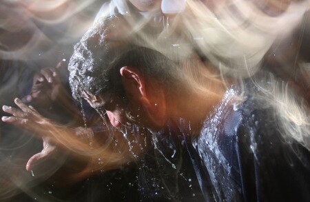 MINNEAPOLIS - OCTOBER 11: Jorge Posada of the New York Yankees gets doused with champagne and beer after a win over the Minnesota Twins in Game Three of the ALDS during the 2009 MLB Playoffs at the Hubert H. Humphrey Metrodome on October 11, 2009 in Minneapolis, Minnesota. <br /><br /><span class="help">(Photo by Jonathan Daniel/Getty Images)</span>