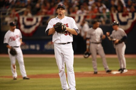 MINNEAPOLIS, MN - OCTOBER 11: Pitcher Joe Nathan #36 of the Minnesota Twins sighs after Alex Rodriguez #13 of the New York Yankees scored in the ninth inning on a Robinson Cano #24 of the Yankees single RBI in Game Three of the ALDS during the 2009 MLB Playoffs at the Hubert H. Humphrey Metrodome on October 11, 2009 in Minneapolis, Minnesota. The Yankees defeated the Twins 4-1. <br /><br /><span class="help">(Photo by Genevieve Ross/Getty Images)</span>