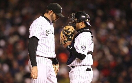 DENVER - OCTOBER 11:  Jason Hammel #46 of the Colorado Rockies listens to catcher Yorvit Torrealba #8 against the Philadelphia Phillies in Game Three of the NLDS during the 2009 MLB Playoffs at Coors Field on October 11, 2009 in Denver, Colorado.  <br /><br /><span class="help">(Photo by Jed Jacobsohn/ Getty Images)</span>