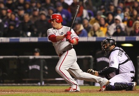 DENVER - OCTOBER 11:  Carlos Ruiz #51 of the Philadelphia Phillies hits a RBI single against the Colorado Rockies in the fourth inning in Game Three of the NLDS during the 2009 MLB Playoffs at Coors Field on October 11, 2009 in Denver, Colorado. <br /><br /><span class="help">(Photo by Jed Jacobsohn/Getty Images)</span>