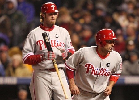 DENVER - OCTOBER 11:  Shane Victorino #8 of the Philadelphia Phillies returns to the dugout after scoring in the top of the fourth inning against the Colorado Rockies in Game Three of the NLDS during the 2009 MLB Playoffs at Coors Field on October 11, 2009 in Denver, Colorado. <br /><br /><span class="help">(Photo by Jed Jacobsohn/Getty Images)</span>